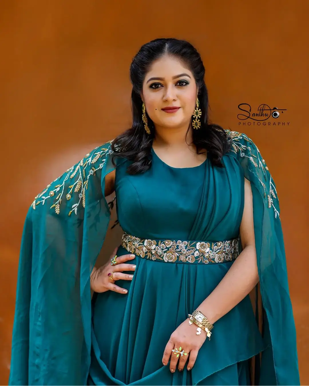 Meghana Raj Wearing Beautiful Earring Blue Gown